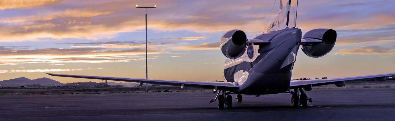 Corporate Executives boarding a private jet for a business charter flight